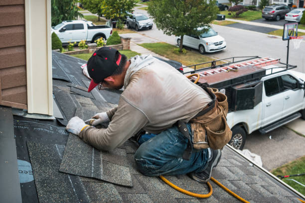 Professional Roofing technician working in Bolinas, CA